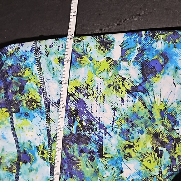 Athleta Athletic Shorts featuring vibrant colors w signature zipper on back. - Picture 7 of 8